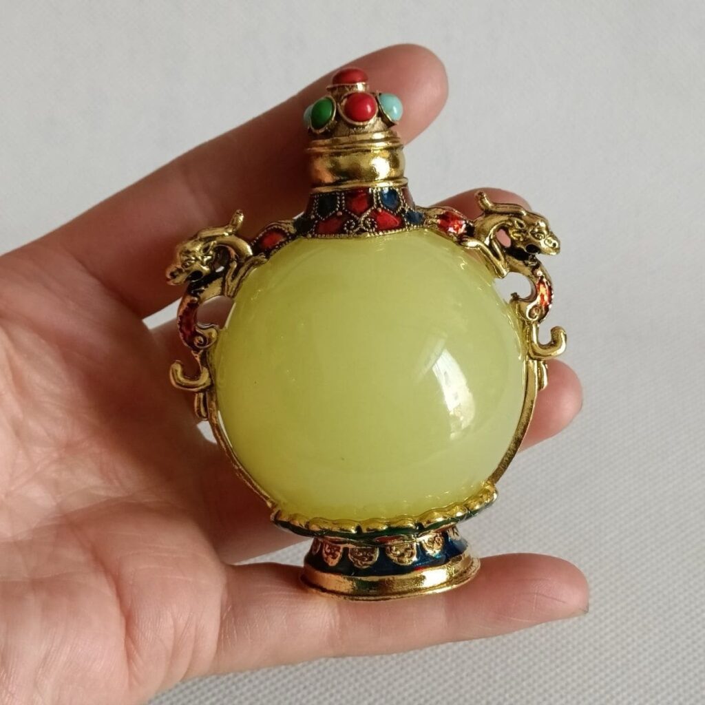 Antique Luminous Orb Snuff Bottle with Gemstone Inlays