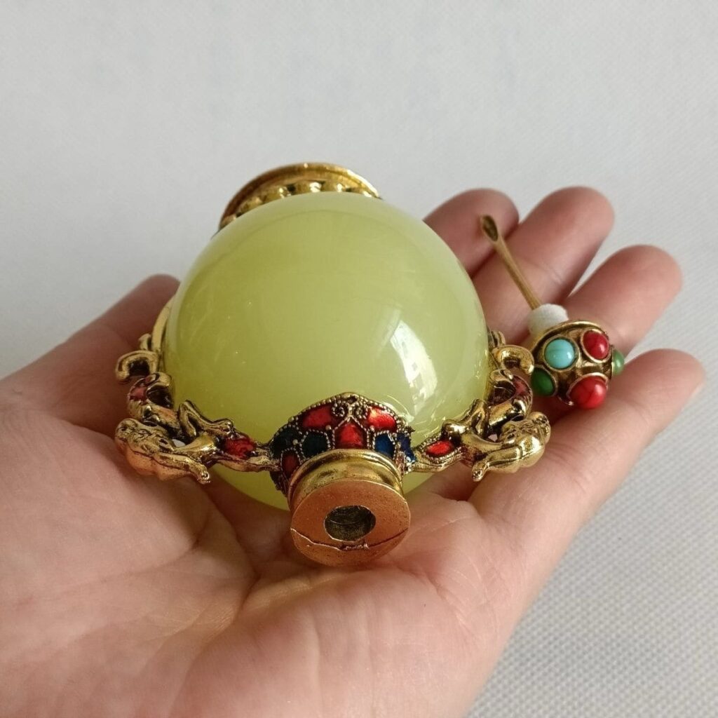 Antique Luminous Orb Snuff Bottle with Gemstone Inlays