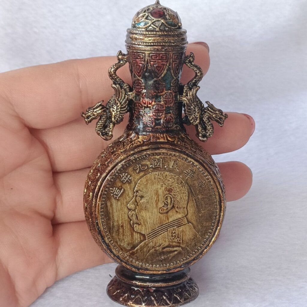 Antique Snuff Bottle with Replica Old Silver Yuan Coins