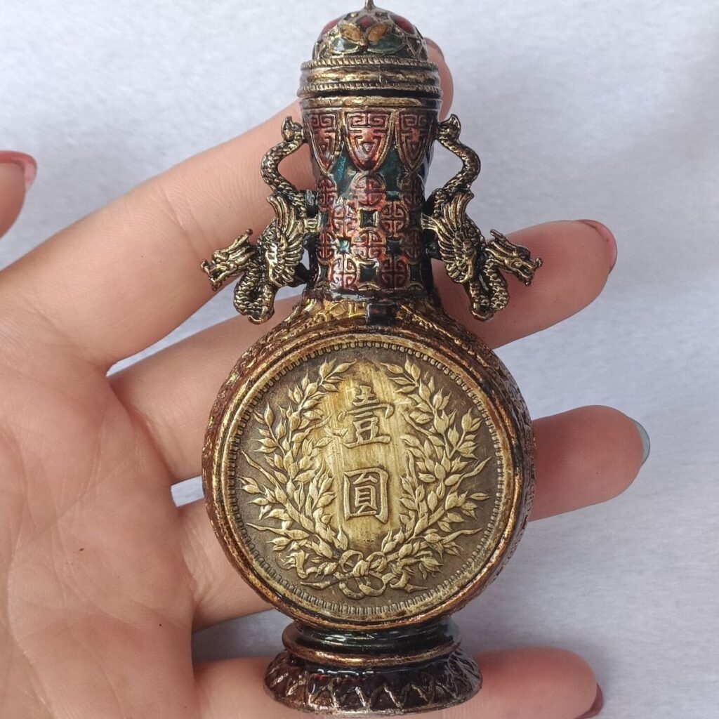 Antique Snuff Bottle with Replica Old Silver Yuan Coins