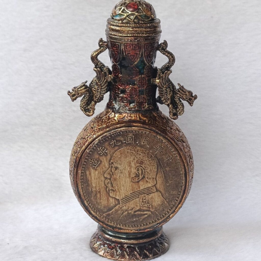 Antique Snuff Bottle with Replica Old Silver Yuan Coins