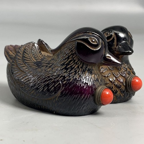 Antique liuli snuff bottle with carved Mandarin ducks