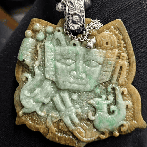 Vintage jade sweater necklace featuring a Sanxingdui mask design with natural jadeite skin texture, embodying rich cultural heritage and auspicious meanings.