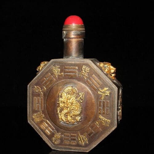 Antique gilded copper octagonal dragon snuff bottle