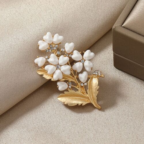 Elegant white matte gold flower brooch with heart petal design