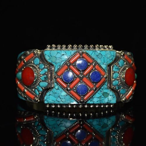 Handcrafted Tibetan bracelet with coral and turquoise inlays