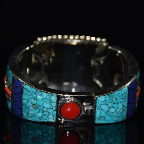 Handcrafted Tibetan bracelet with coral and turquoise inlays