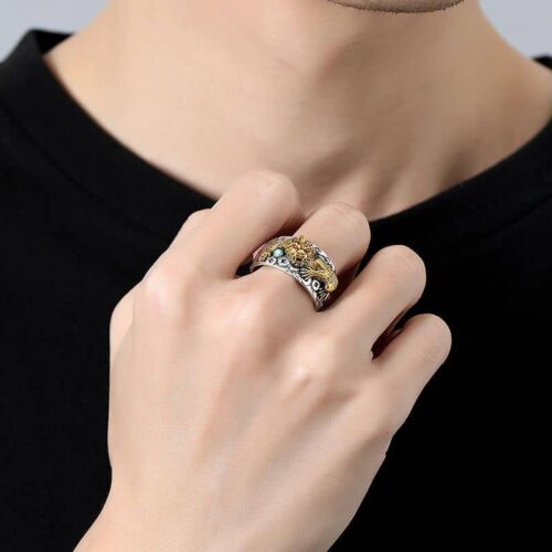 Man wearing S925 Pure Silver Pixiu ring, displaying fit and bold style.