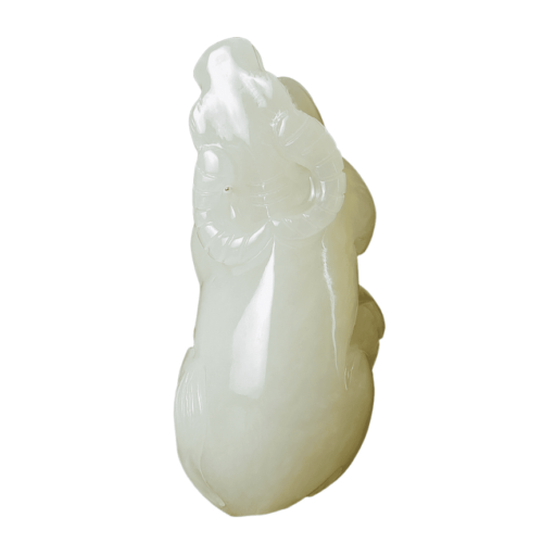 Pendentif en jade de Hotan pour le bœuf du zodiaque, sculpté à la main, d'un éclat très gras, de forme pleine.