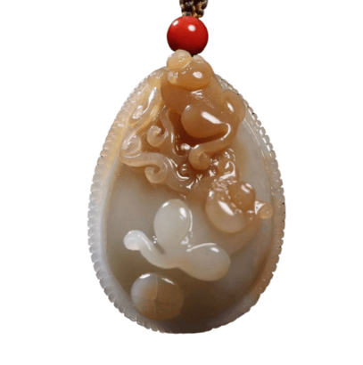 Front view of hand-carved Hetian jade monkey pendant symbolizing longevity and blessings